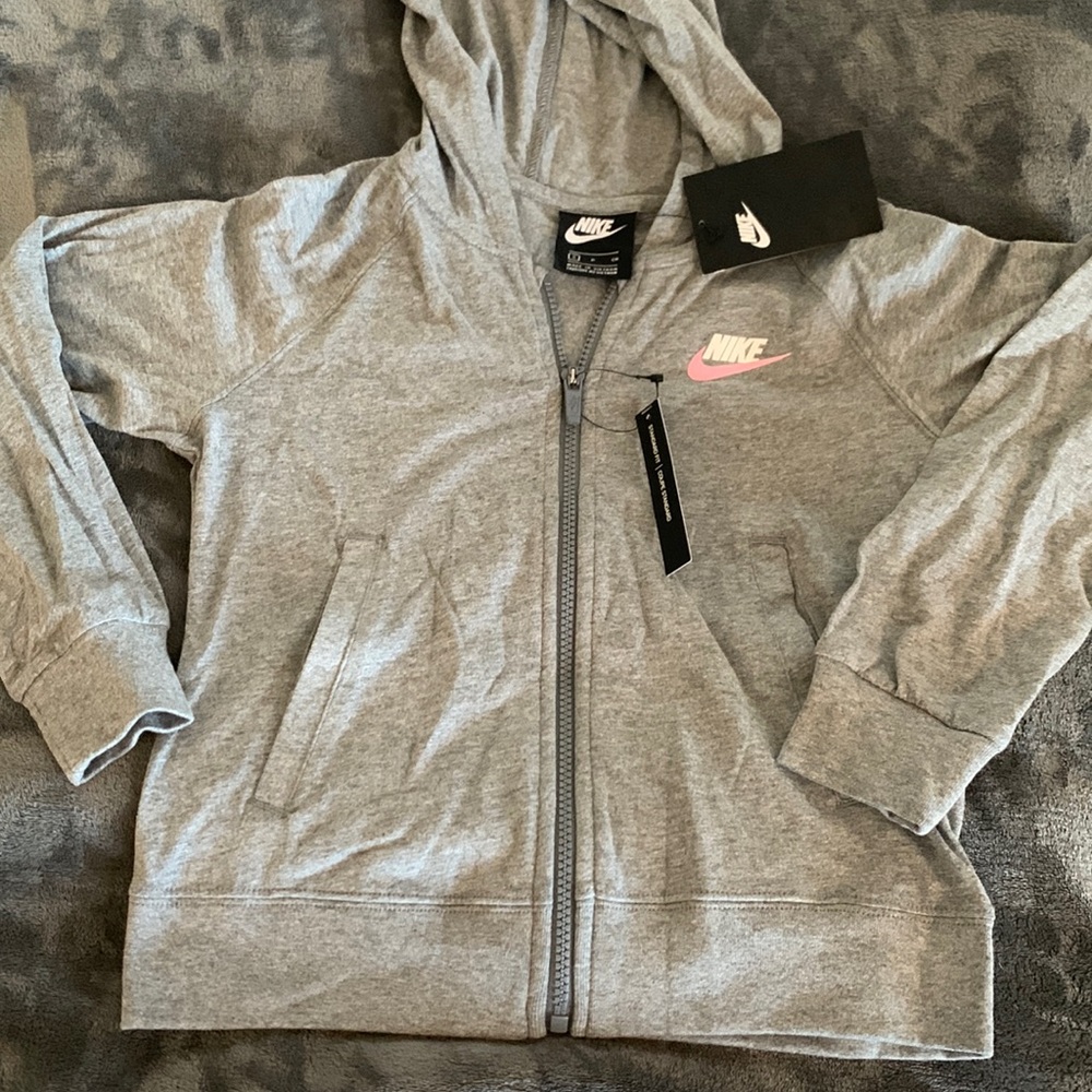 Nike Girls Grey hoodie. Zippered with pockets. Long-sleeved. Size: S.